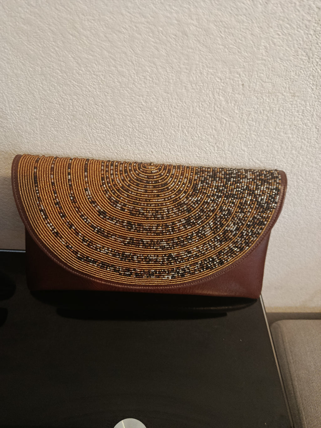 Pochette en cuir perlées