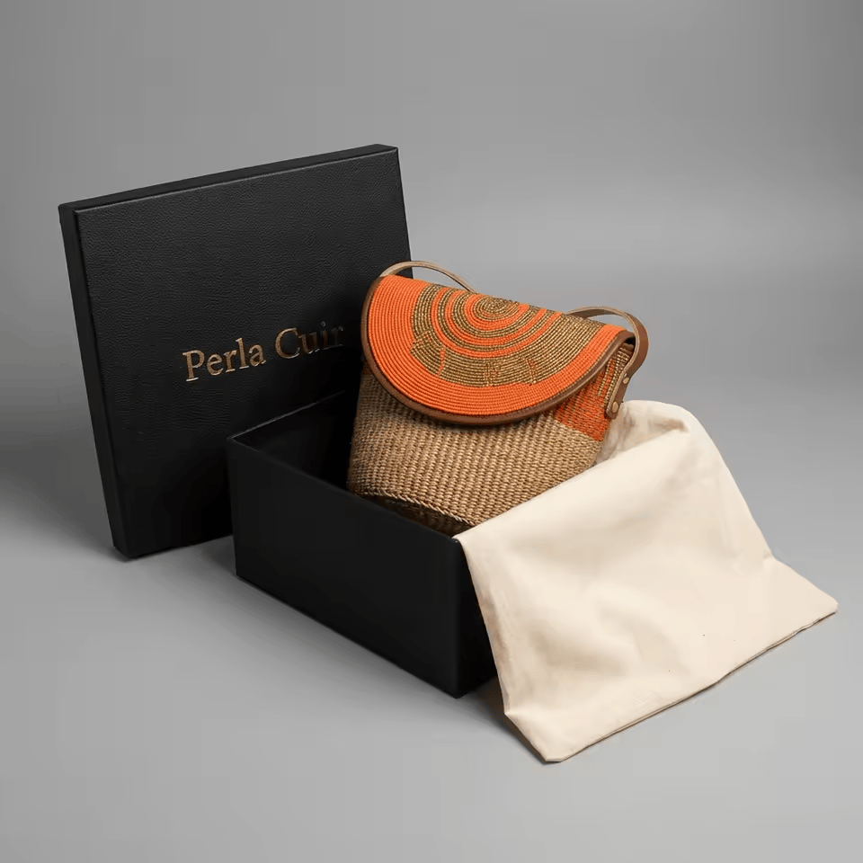Jua Kubwa – Sac seau sisal naturel rabat cuir orange spirale perles | Perlacuir
